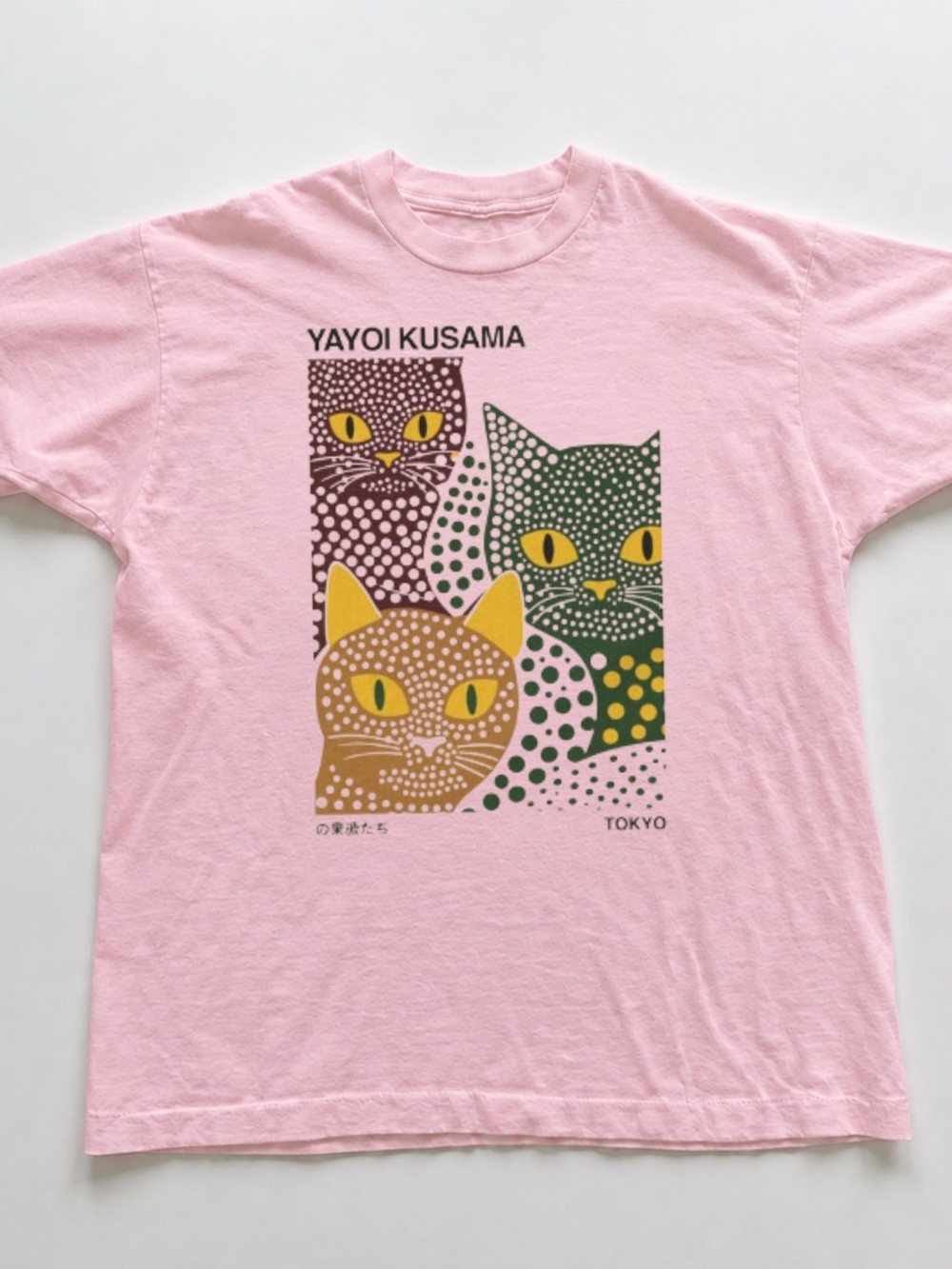 Light Pink Cat Graphic Tee with Yellow & Green Accents